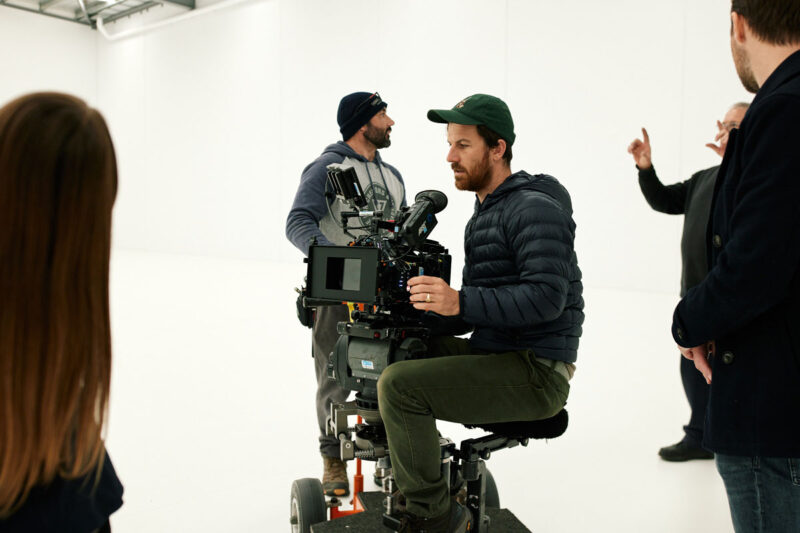 A film crew inside a studio